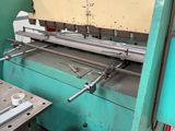 an image of a machine that is working on a piece of paper