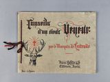 an old book with a deer head and a cross on it