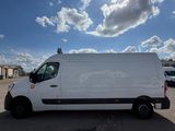 a white van that is parked in a parking lot