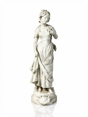 a statue of a woman standing on a pedestal