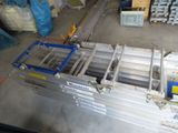a picture of a conveyor belt in a warehouse