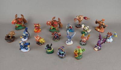 a lot of figurines that are sitting on a table