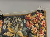 une image représentant une tapisserie suspendue à une corde à linge