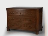 an image of a chest of drawers in a room