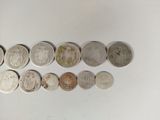 a lot of coins that are sitting on a table