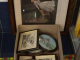 three framed pictures of a woman in a dress in a box
