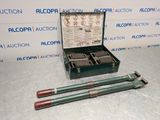 an image of a box with two tools in it on a table
