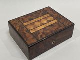 an image of a wooden box on a white surface