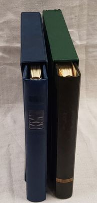 two books are sitting next to each other on a white surface