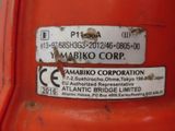 a close up of a label on a red vehicle