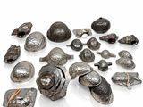 a lot of silver objects that are on a white surface