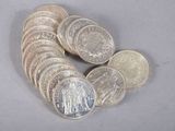 a pile of coins sitting on top of a table