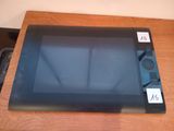 a picture of a tablet computer sitting on a table