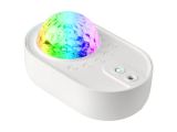 a close up of a colorful ball on a white surface
