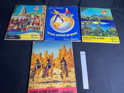 three children ' s books are sitting on a black surface