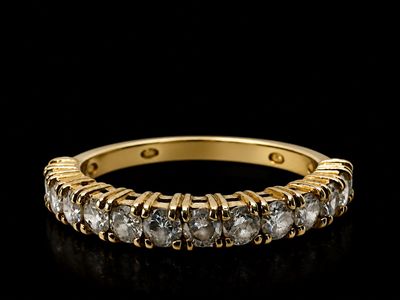 Bague en or jaune 14 carats sertie de diamants
