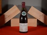 a bottle of wine that is sitting on a table