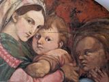 a painting of a woman holding a child in her arms