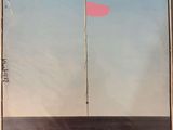 an image of a picture of a red flag in the middle of a picture
