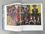 an open book with a picture of a military parade