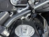 a close up view of a motorcycle with the handlebars up