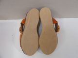 pair of women ' s shoes on a white surface with a white background