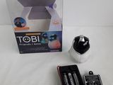 a box that has a camera and a remote control in it