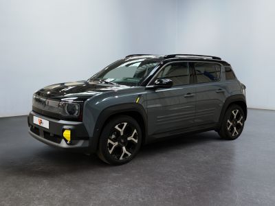 the grey jeep compass is parked in a room with a white wall