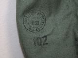 a close up of a tie with a stamp on it