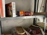 a shelf with various items on it in a room