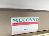 a picture of a mecano label on a piece of luggage