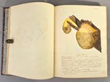 un livre ouvert sur lequel est dessiné un oiseau