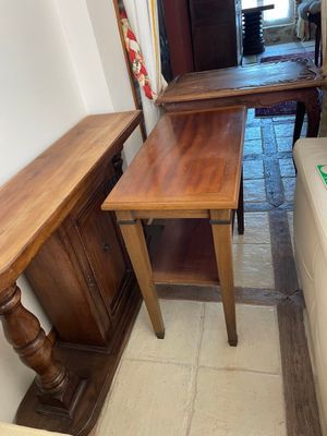 a small table and a couch in a living room