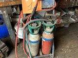 many different types of welding equipment in this garage
