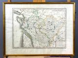 une vieille carte de la France posée sur un chevalet