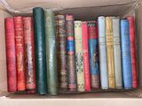 a box full of books that are sitting on a table