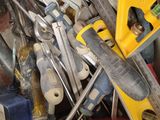 a pile of tools and tools sitting on the floor