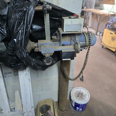 an image of a machine that is in a garage