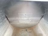a toilet that is in the middle of a dirty floor
