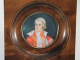 painting of a man in a red coat in a wooden frame