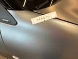 a close up of a car with a sticker on it ' s side