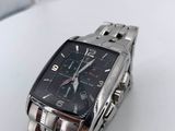 a close up of a watch on a table