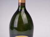 an image of a bottle of champagne sitting on a table