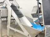 an image of a conveyor belt in a factory