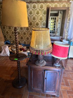 a lamp that is sitting on a table in a room