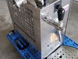 a machine that is sitting on top of a pallet
