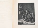an open book with a picture of a man sitting on a chair