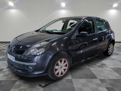 a picture of a grey car parked in a garage