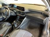 a picture of a car interior with a steering wheel and dashboard