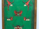 an image of a green pinball machine with red birds on it